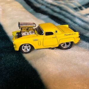 Yellow Thunderbird Toy Car